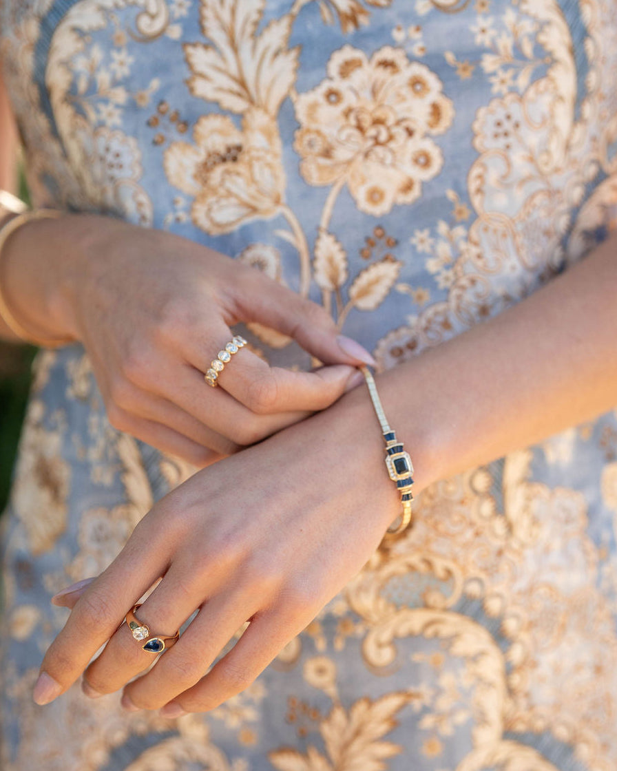 Bezel Set Oval Diamond Half Eternity Band