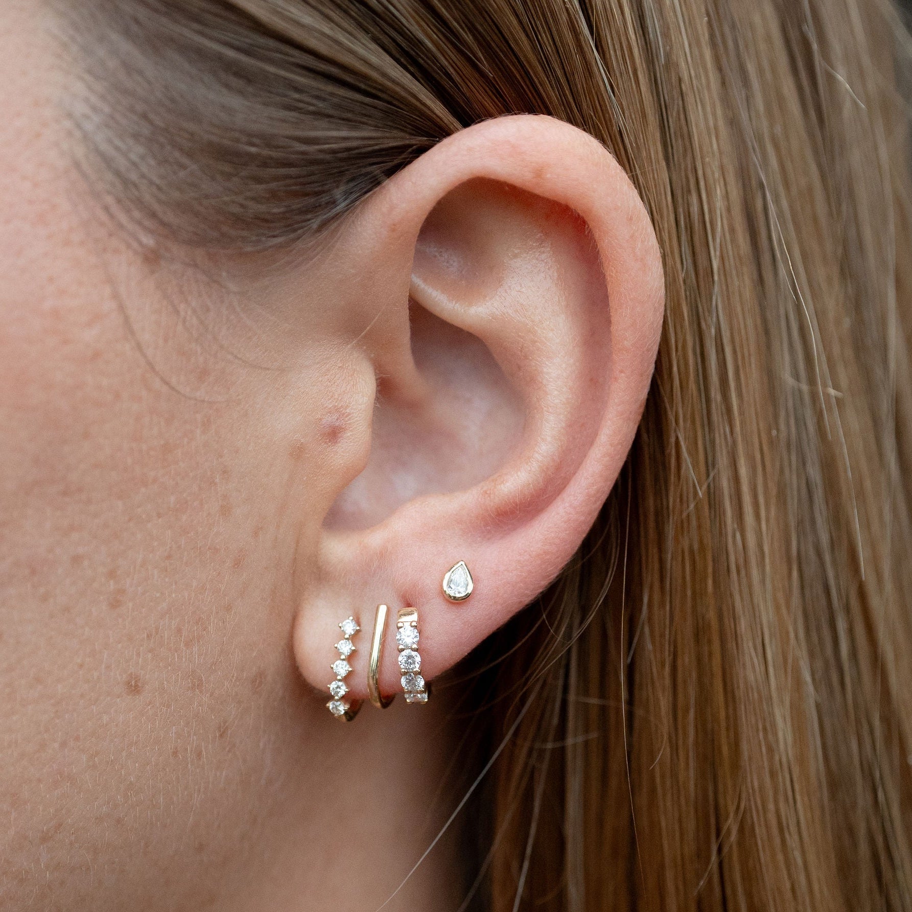 Bezel Set Pear Diamond Stud Earring