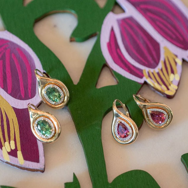 Oval Shaped Green Tourmaline Earrings with Diamond Halo and Gold Bezel