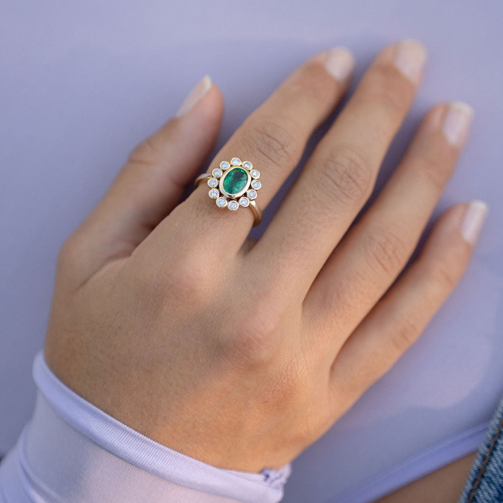 Emerald Ring with Bezel Diamond Halo